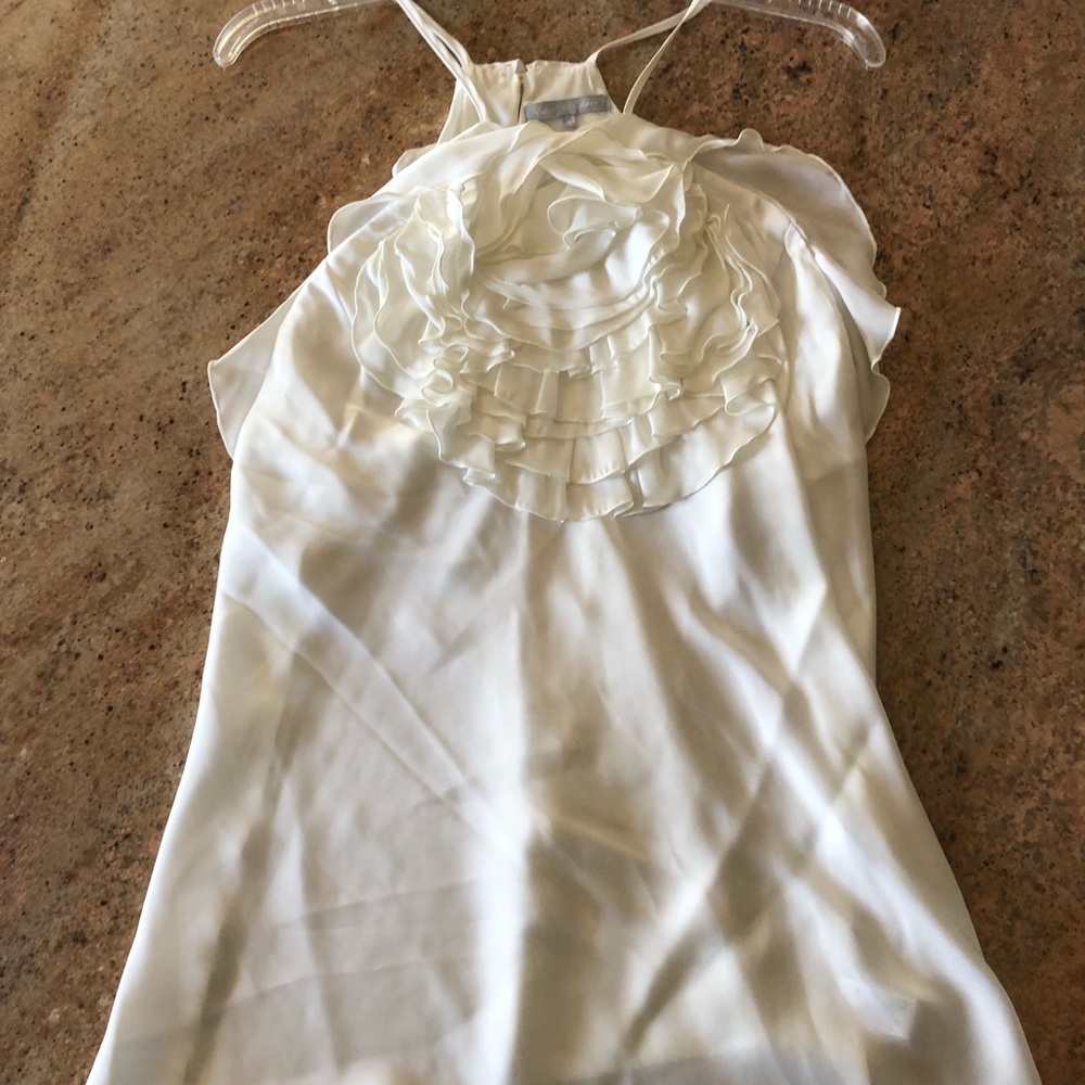 Flower ruffled top.